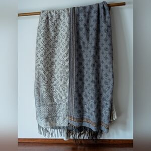 Two  Louis Vuitton Monogram scarves specifically a large shawl-style accessory